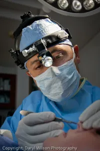 Dr. Merheb performing a cosmetic surgery procedure