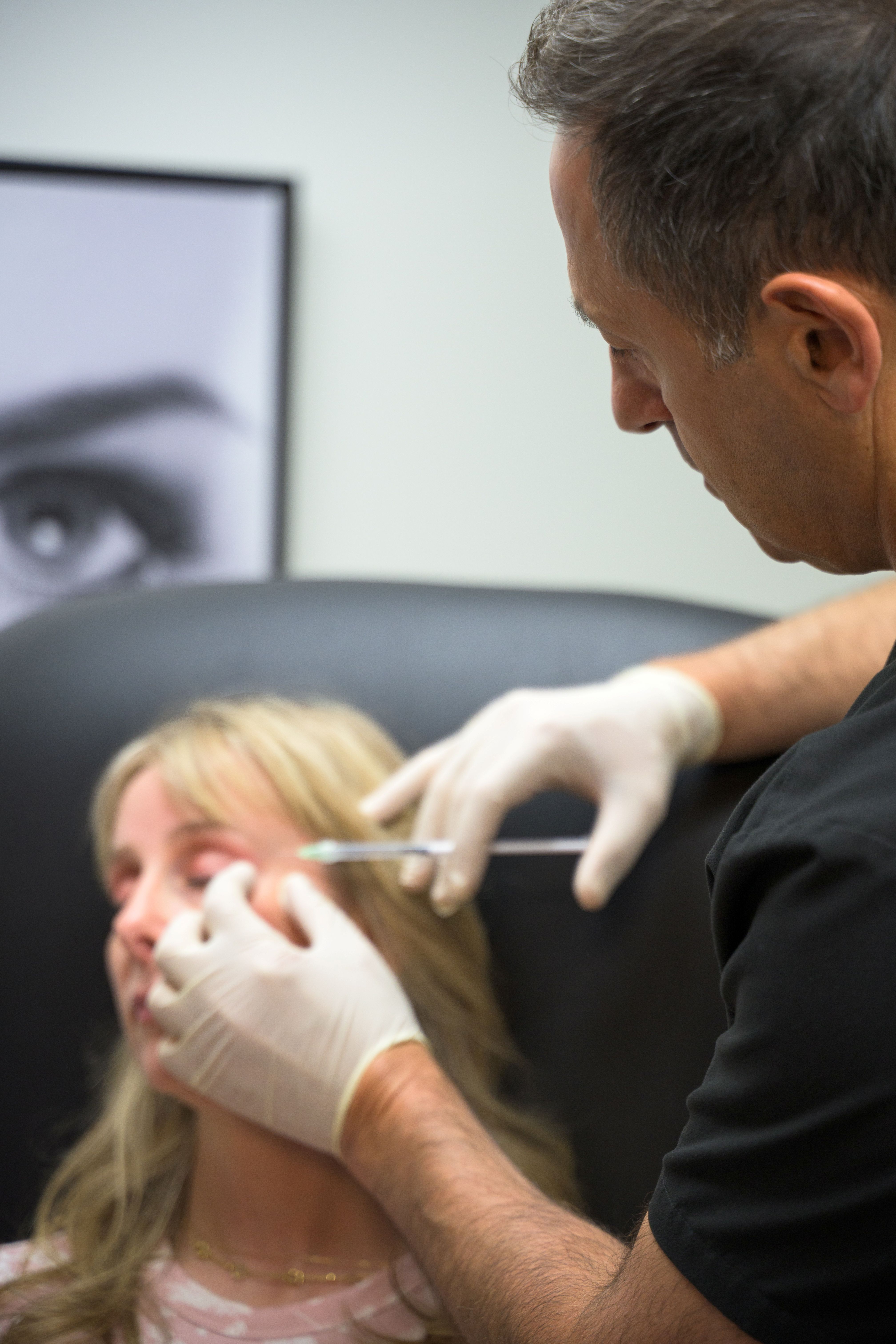 Dr. Merheb giving a patient a botox